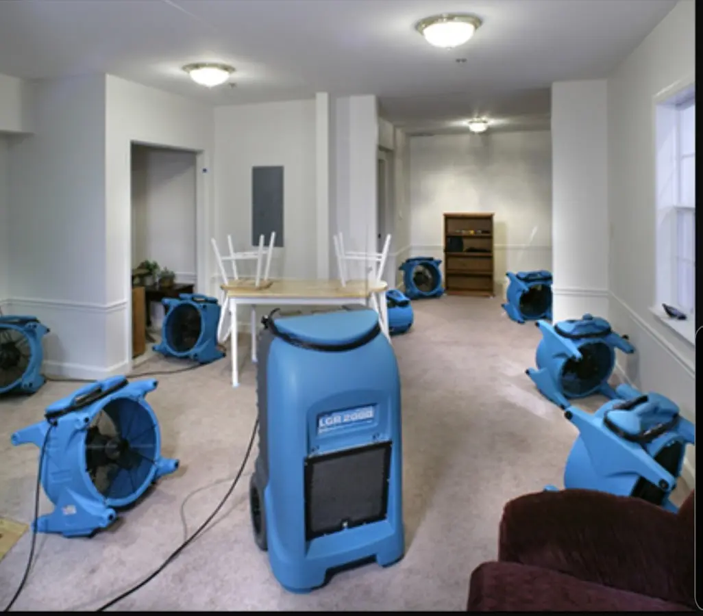 Air movers and dehumidifier setup for Water Extraction & Removal in Middlebury